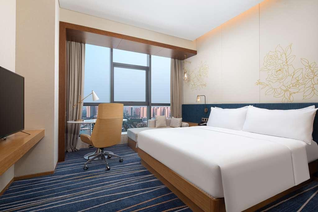 Hilton Garden Inn Zibo Zhangdian Номер фото