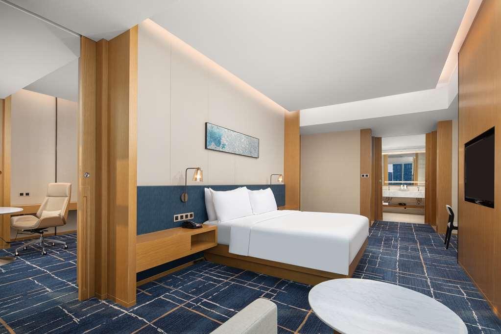 Hilton Garden Inn Zibo Zhangdian Номер фото
