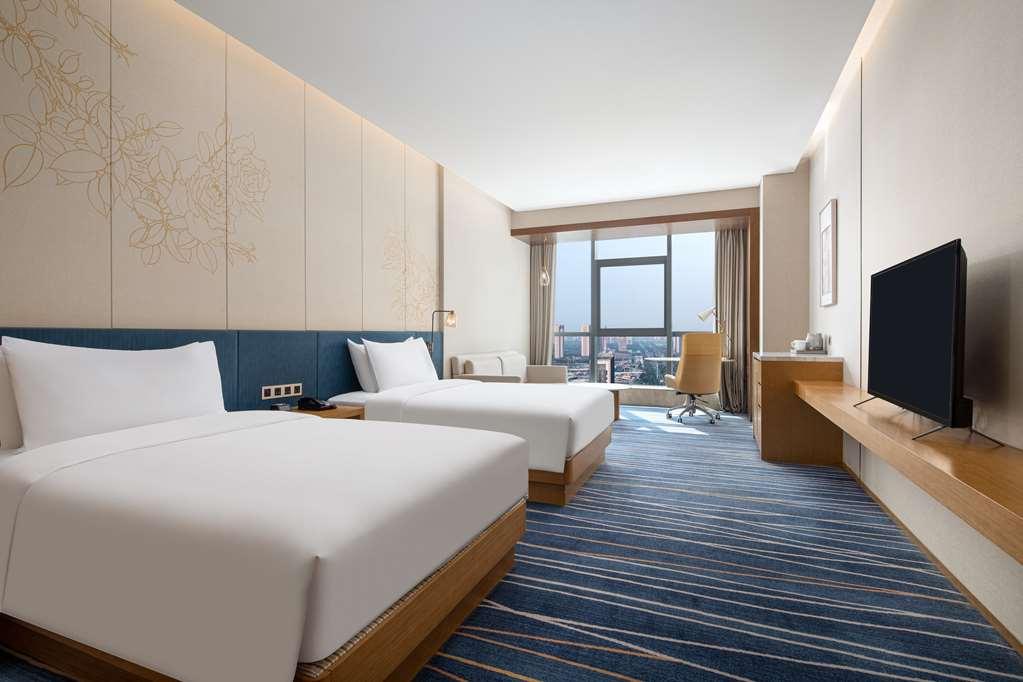 Hilton Garden Inn Zibo Zhangdian Номер фото